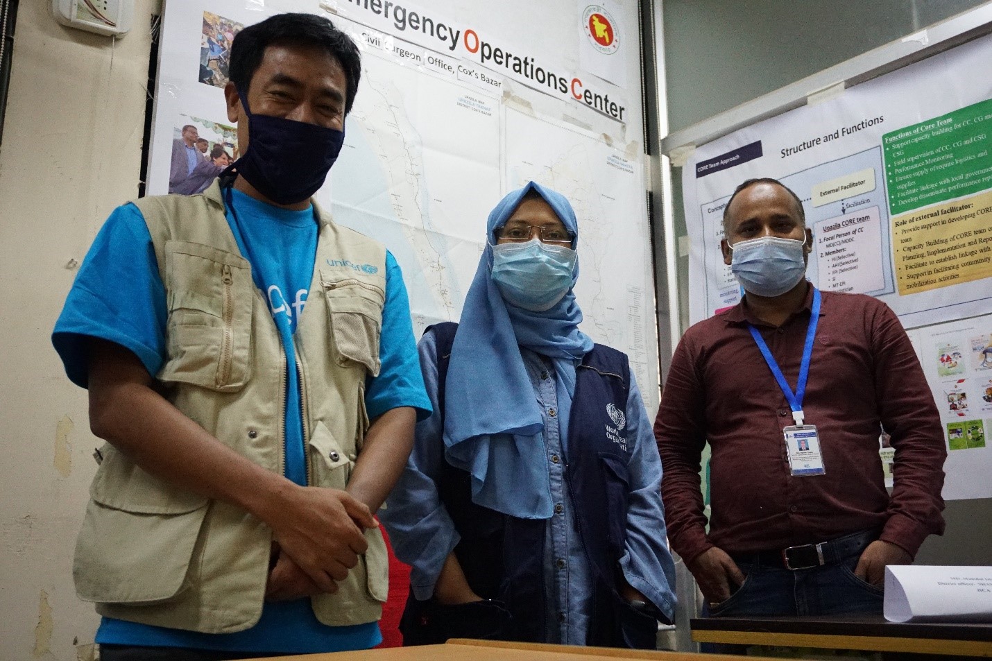 UNICEF MIS Consultant, Usaimong Marma; WHO Technical Support Officer, Dr Umme Asma Absari; and JICA District Officer, Md Mahidul Islam, are some of the staff ensuring the Control Room’s daily activities. WHO Bangladesh/Tatiana Almeida.